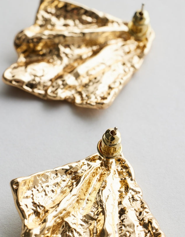 Belle Statement Earrings close up flat lay