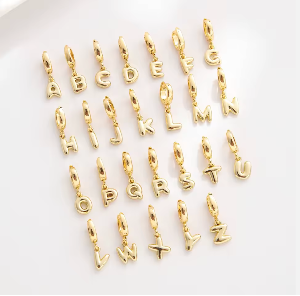 Initial Letters in Gold all letters flatlay