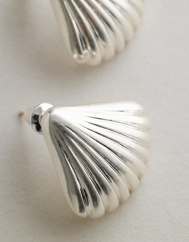 Tanah Shell Earrings - Silver close up grey background