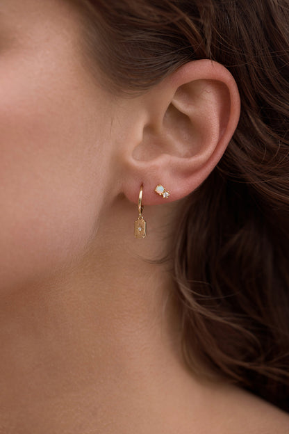 Ace Diamond Huggies - Gold on womens ear