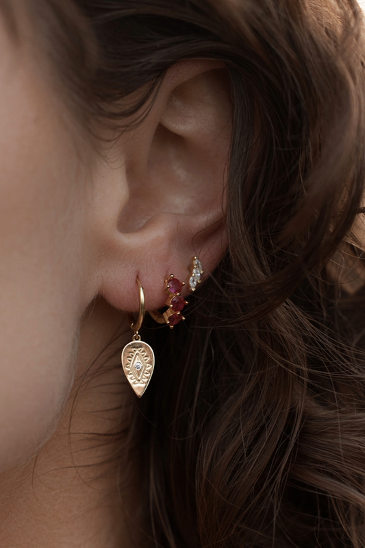 Amara Pink Gemstone Earrings on model ears close up