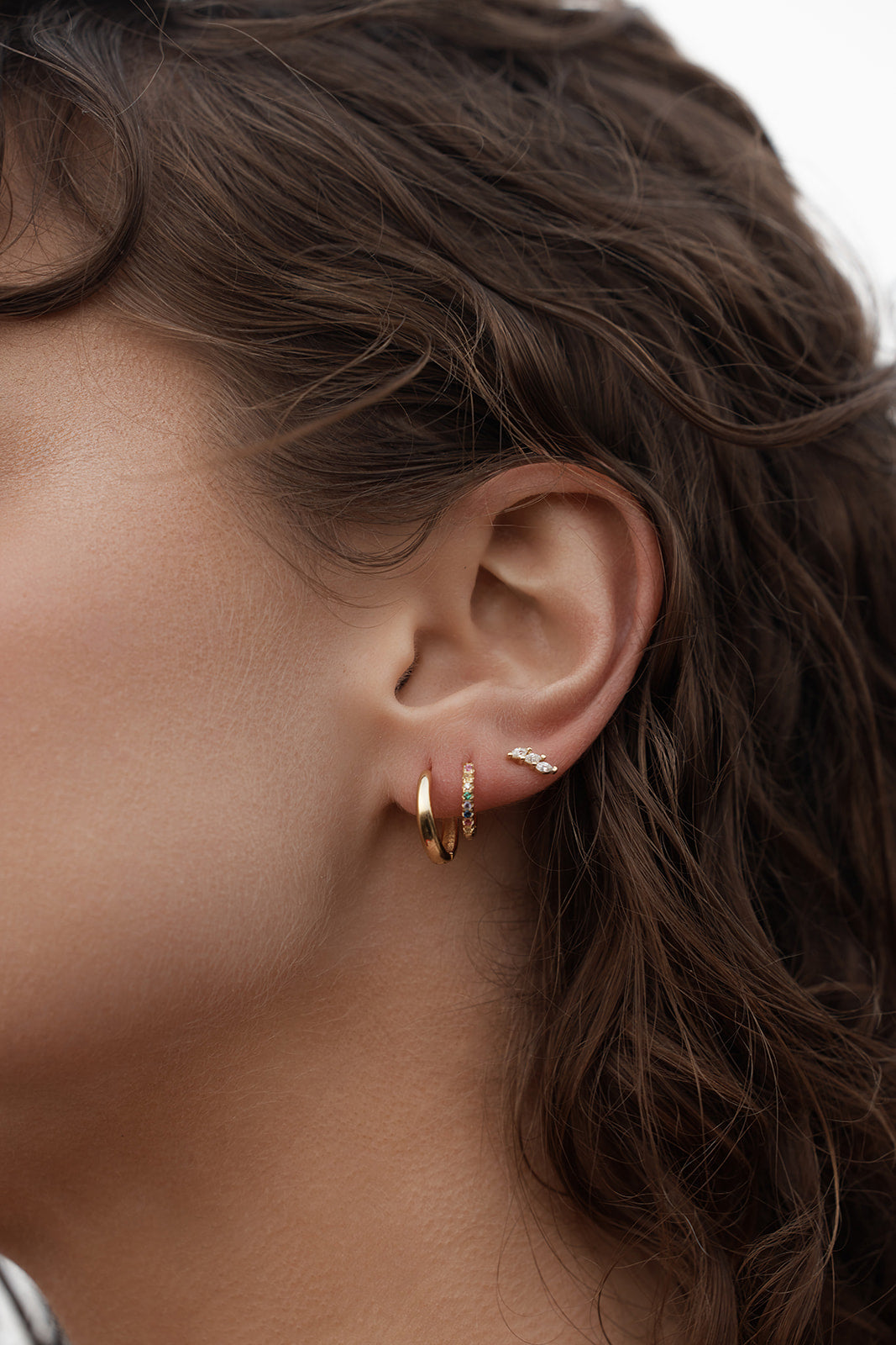 Capri Hoop Earrings Close-up of an ear