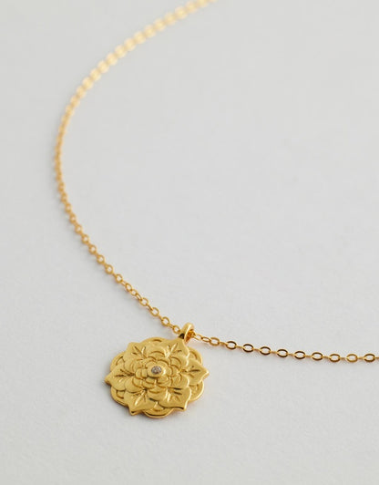 Celestara Mandala Necklace close up pendant flat lay