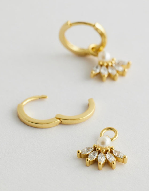 Celestine_Pearl_Earrings side angle flat lay