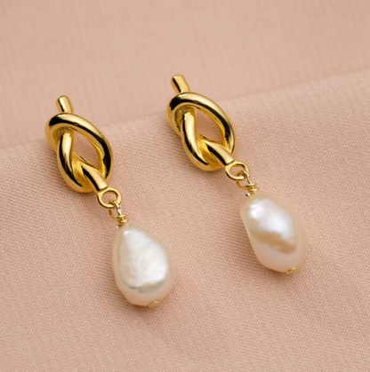 Chloe Pearl Studs - Gold with twist detailing and drop pearl embellishments.