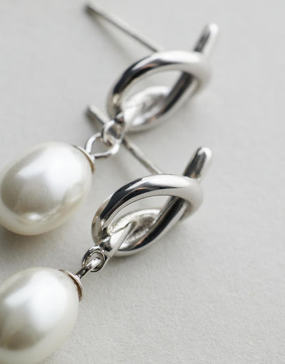 Chloe Pearl Studs - Silver flat lay on grey background