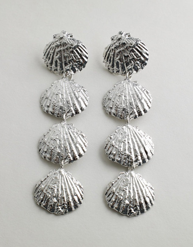 Collecting Shells Earrings - Silver on a light gray background