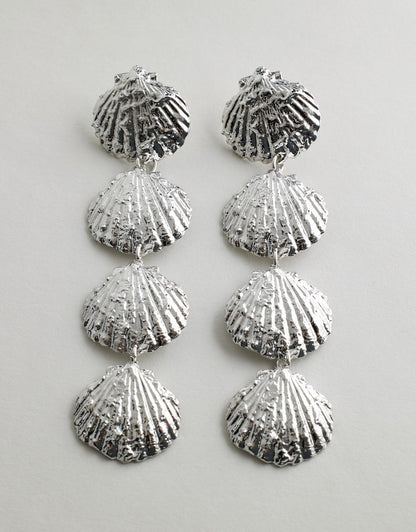 Collecting Shells Earrings - Silver on a light gray background