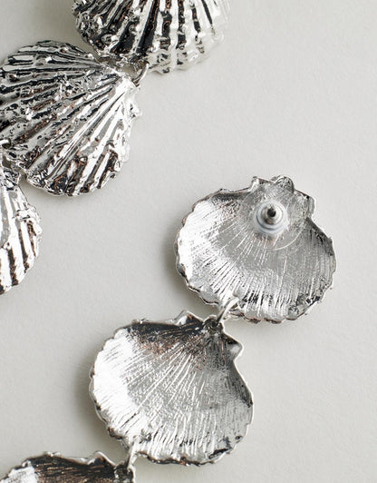 Collecting Shells Earrings - Silver on a light gray background