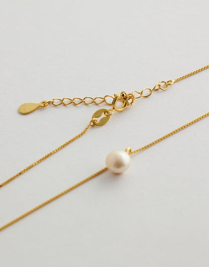 Elowen Pearl Necklace close up flay lay