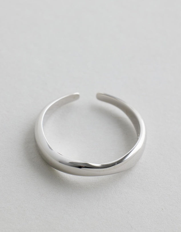 Hannah Wave Ring - Silver ring on a light gray background