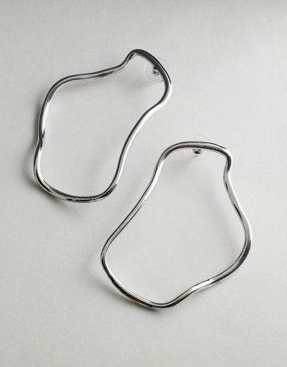 Harlow Earrings - Silver on a light gray background