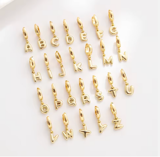 Initial Letters in Gold all letters flatlay