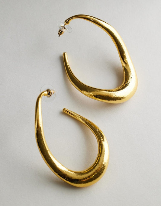 Irregular Hoop Rayne Earrings - Gold on a light gray background
