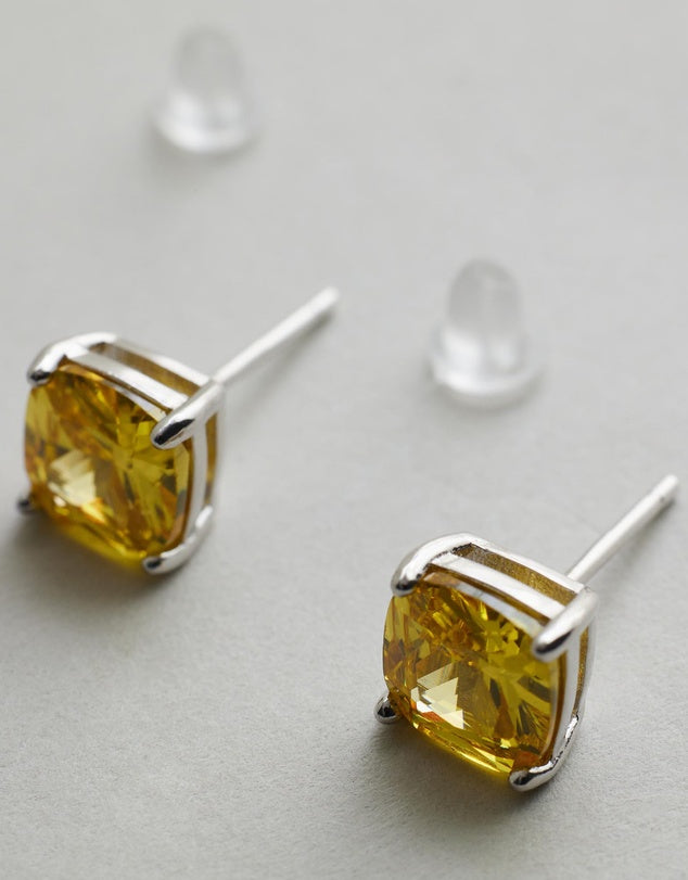 Lotti Citrine Studs side view on grey background