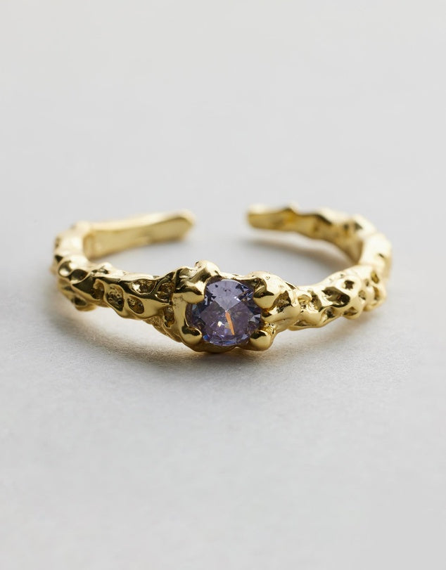 Mia Ring with purple gemstone front flat lay view