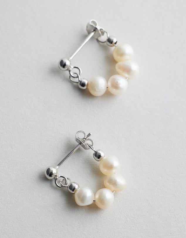 Mickie Pearl Hoop Earrings - Silver flat lay
