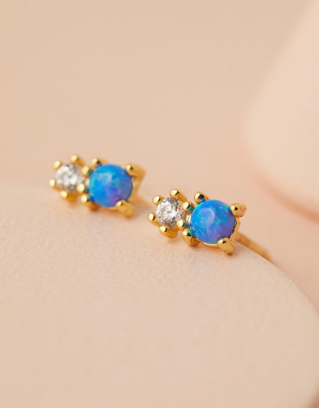 Milly Studs - Blue Opal close up on pink back ground