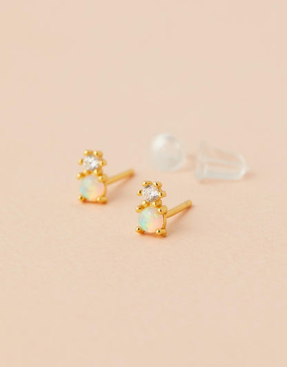 Milly Studs - White Opal flat lay side view close up
