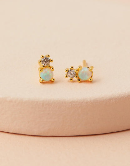 Milly Studs - White Opal flat lay close up
