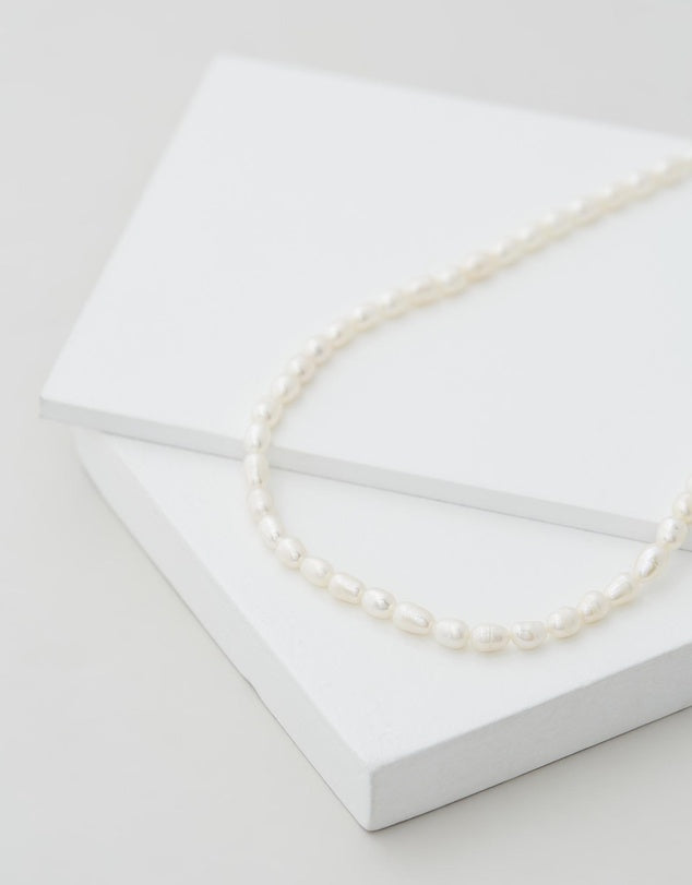 Poppy Pearl Choker flat lay