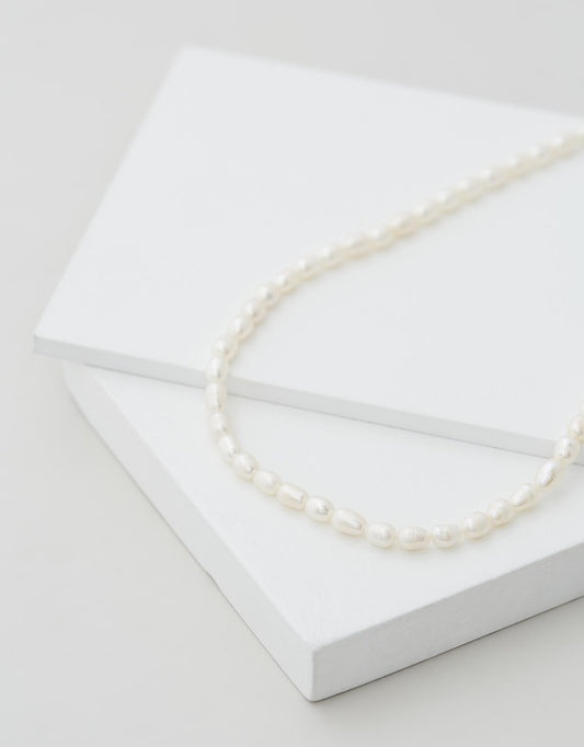 Poppy Pearl Choker flat lay