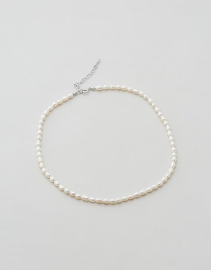 Poppy Pearl Choker close up flat lay