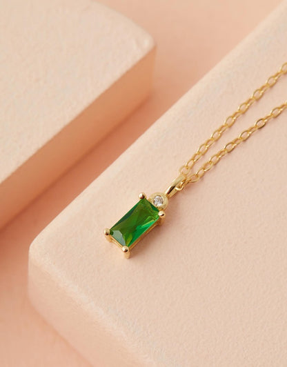 Rita Emerald Necklace close up of stone flat lay
