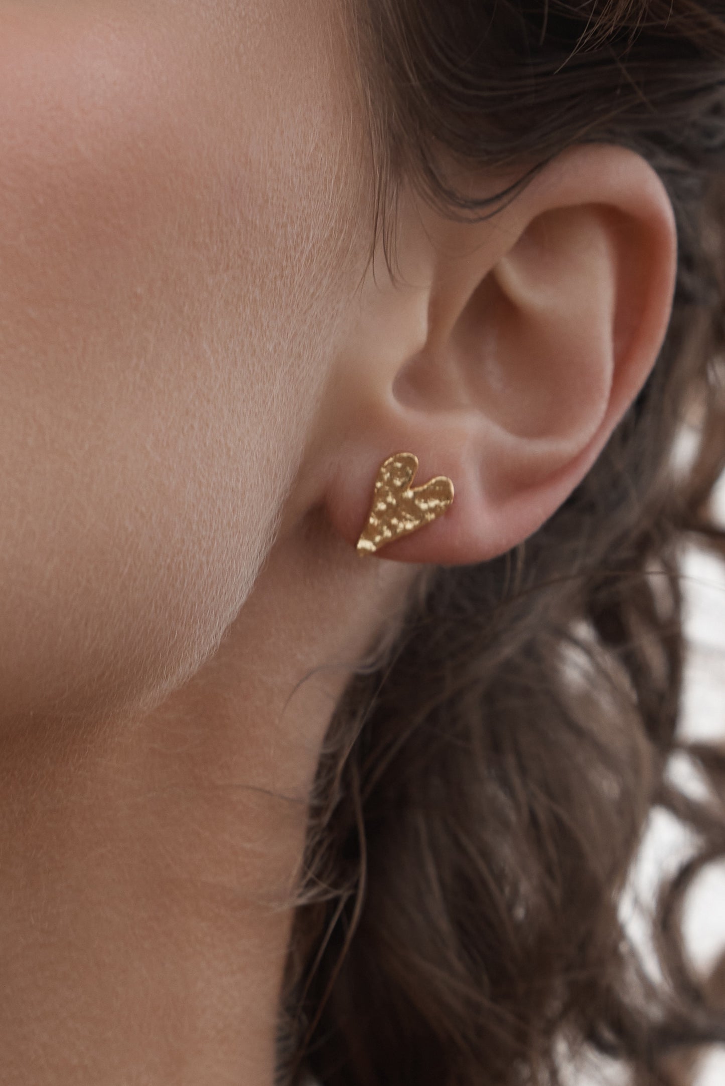 Rivellia_Heart_Earrings on model ears