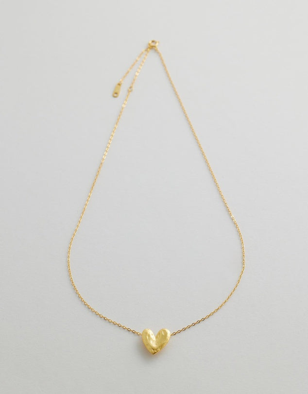 Rivellia Heart Necklace flay lay