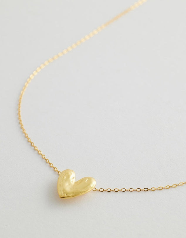 Rivellia Heart Necklace flay lay close up