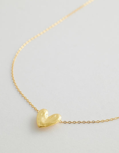 Rivellia Heart Necklace flay lay close up