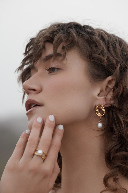 Rome Pearl Earrings on womens ear, side of face