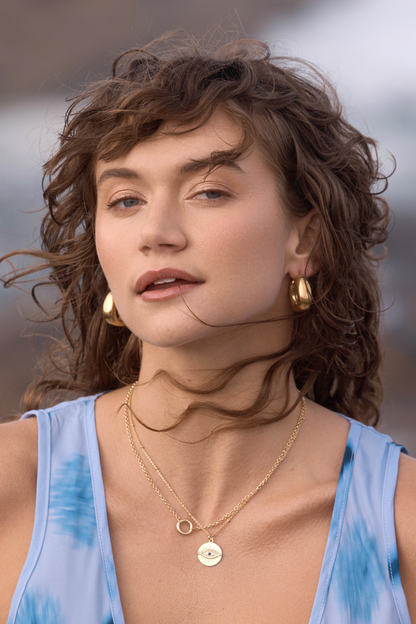 Sally Chunky Hoop Earrings - Gold front image of model wearing earrings and necklaces