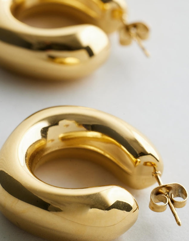 Sally Chunky Hoop Earrings - Gold flat lay close up