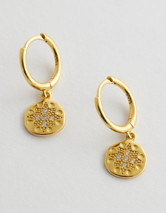 Seraphis Huggie Earrings - Gold flay lay