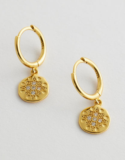 Seraphis Huggie Earrings - Gold flay lay