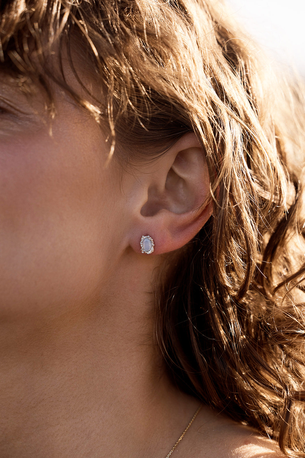 Simone Opal Studs - Silver on women's ear