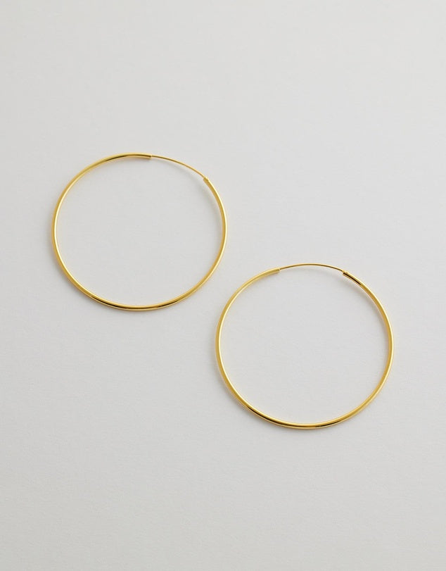 Solara Hoop Earrings flat lay