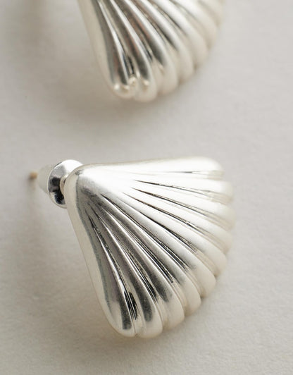 Tanah Shell Earrings - Silver close up grey background