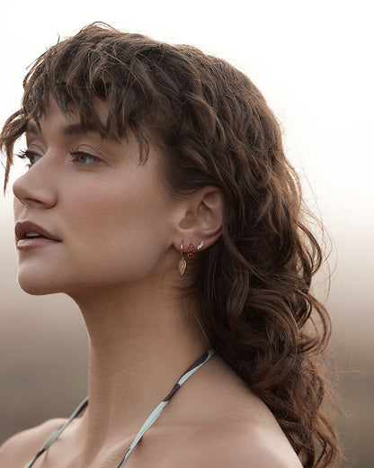 armani earring set gold model side angle