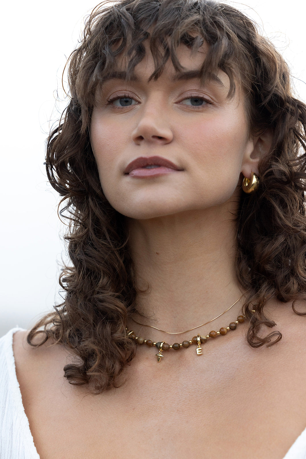 initial necklace tortoise brown close up model