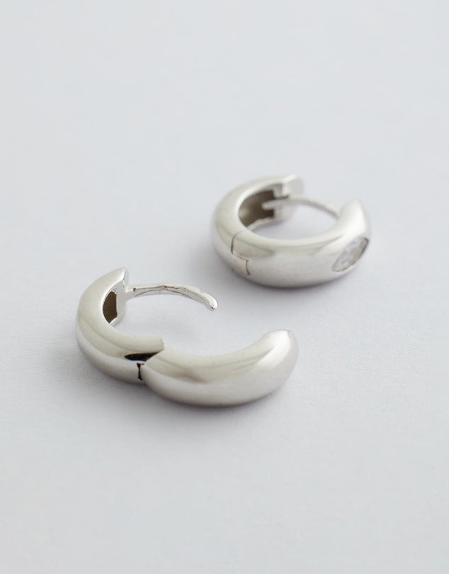 lunara hoop earrings silver flat lay open