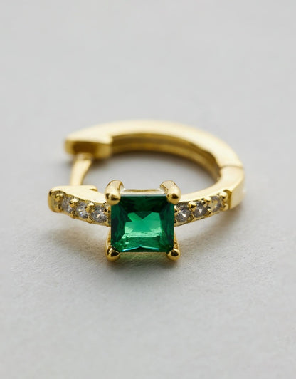 nikki hoop gold green emerald stone close up
