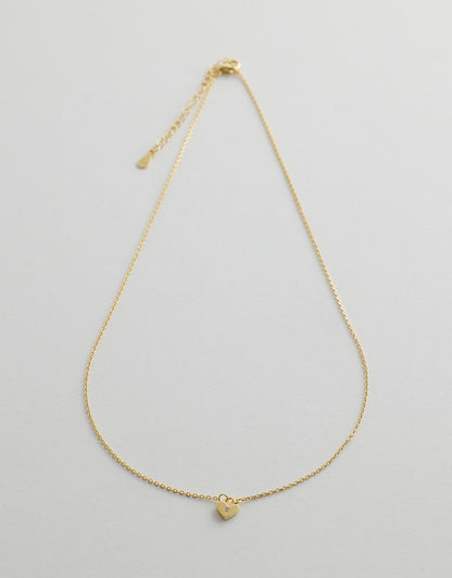 solstice heart necklace flay lay