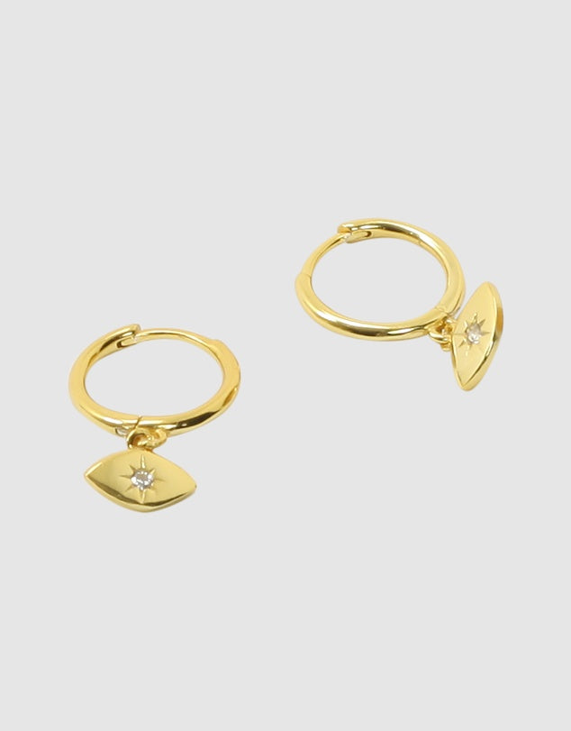 Evil Eye Huggies - Gold flat lay on a beige background