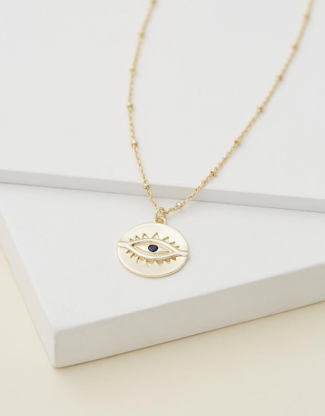 Evil Eye Necklace - Gold close up flat lay
