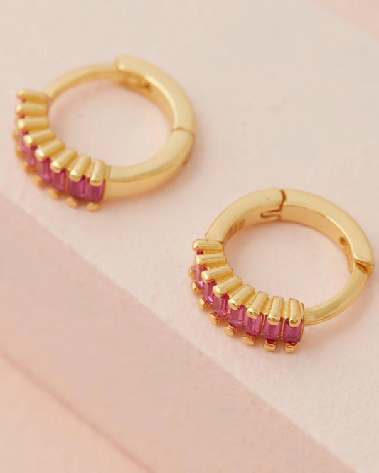 Lennox Huggies - Gold & Pink close up with pink background