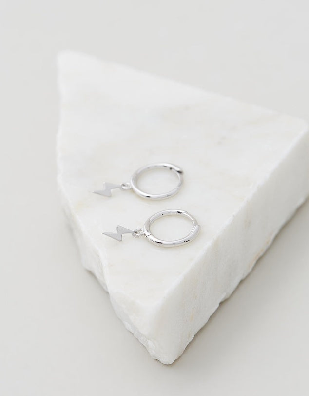 Lightning Bolt Huggies - Silver flat lay on white background