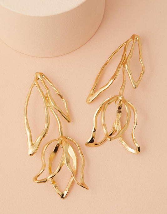 Like A Rose Earrings top view pink background flat lay